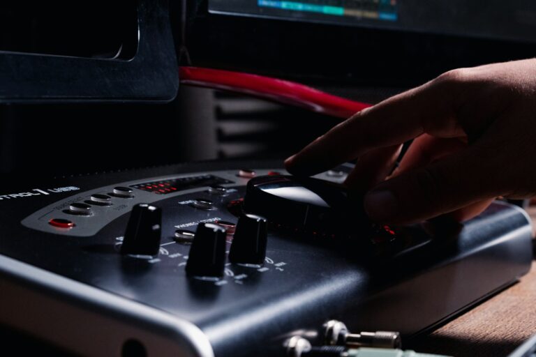 a close up of a person pressing buttons on an electronic device