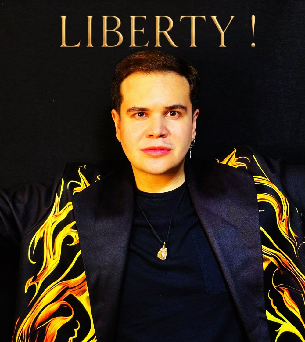 Alexis Guadner in a flame-patterned jacket on the artwork for his debut single LIBERTY!