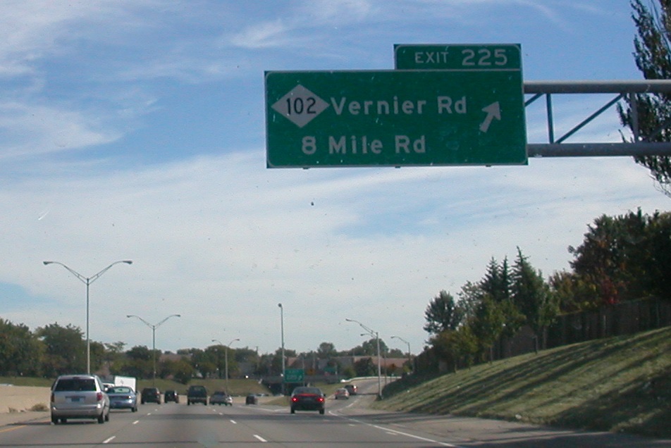 Green highway sign on I-94 for the 8 Mile Road and Vernier Road exit