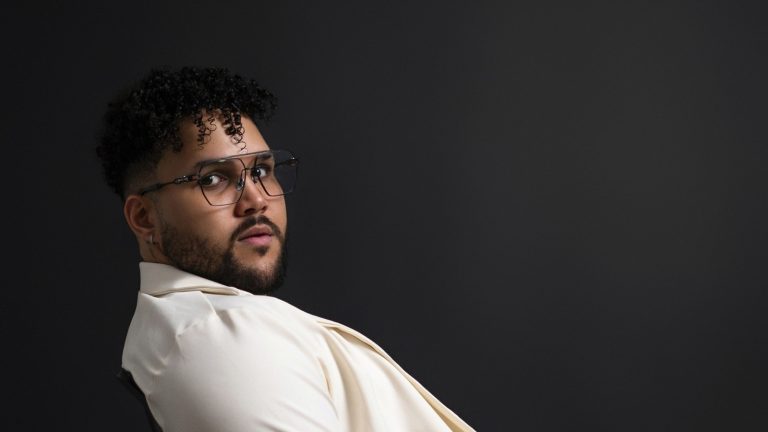 ARAM, Dominican singer and producer based in Miami, in a studio portrait