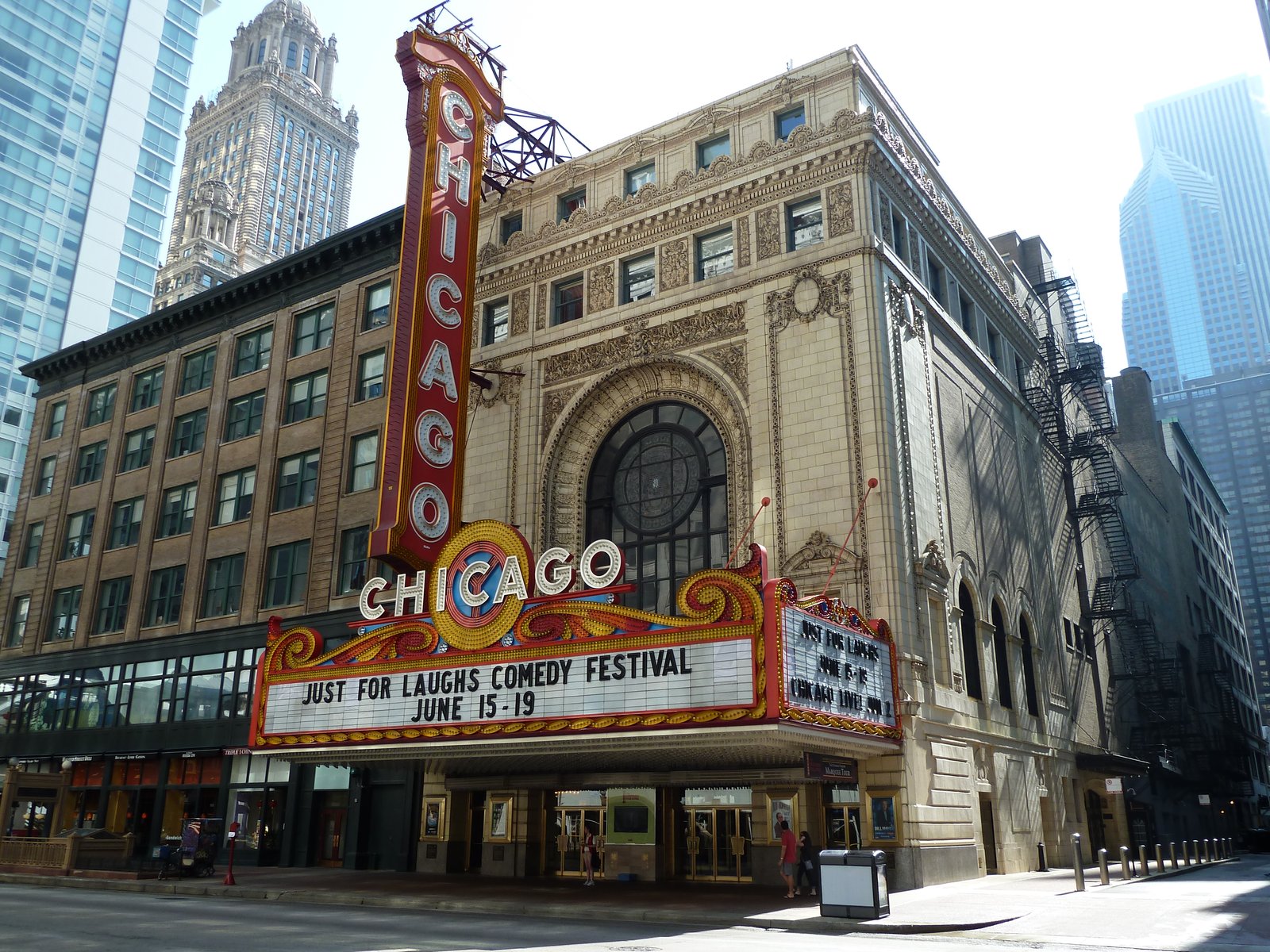 The Chicago Theatre on State Street with its marquee advertising a comedy festival