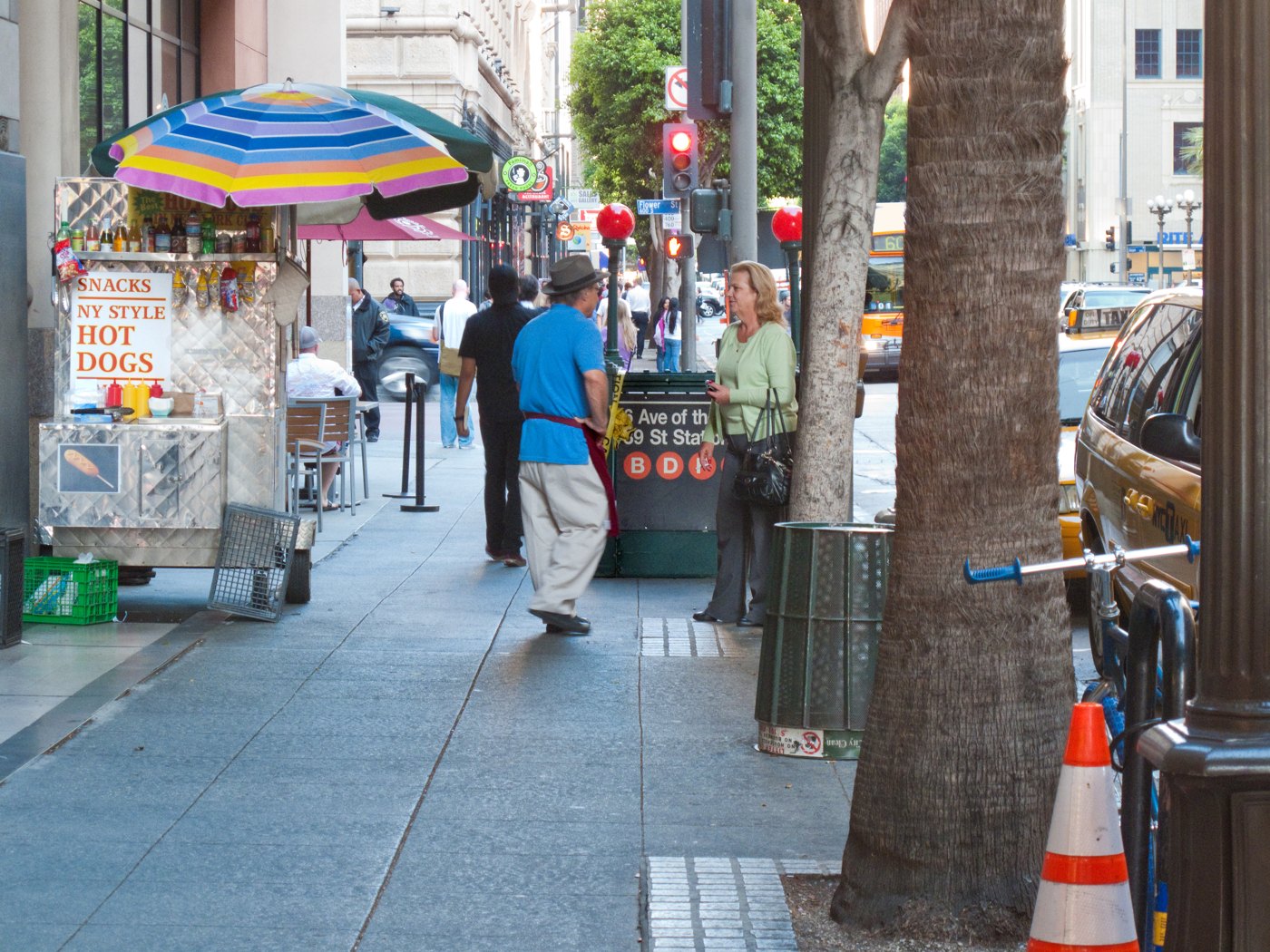 A downtown Los Angeles sidewalk dressed as a New York City subway entrance for a film shoot