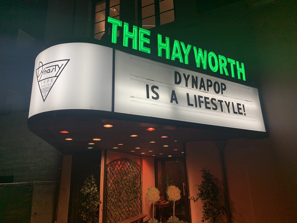 The Dynasty Typewriter marquee at the Hayworth Theatre on Wilshire Boulevard at night