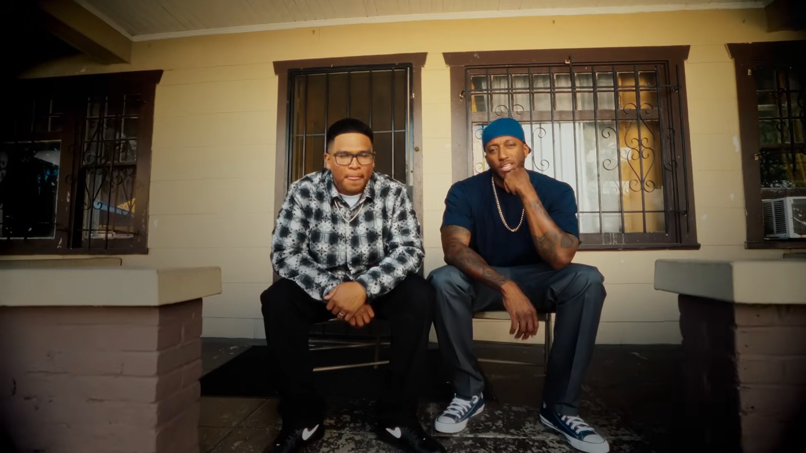 A porch scene from the Big Brother remix music video