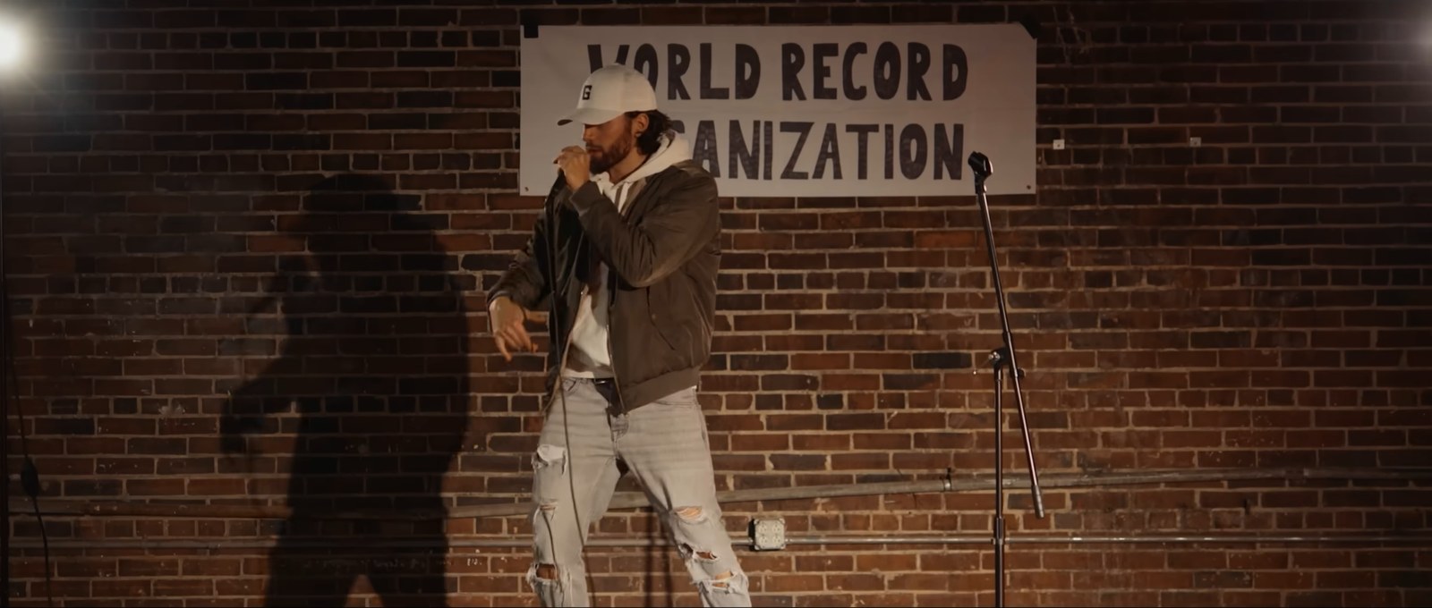 Gawne performing under a World Record Organization banner in the CHOPPER video