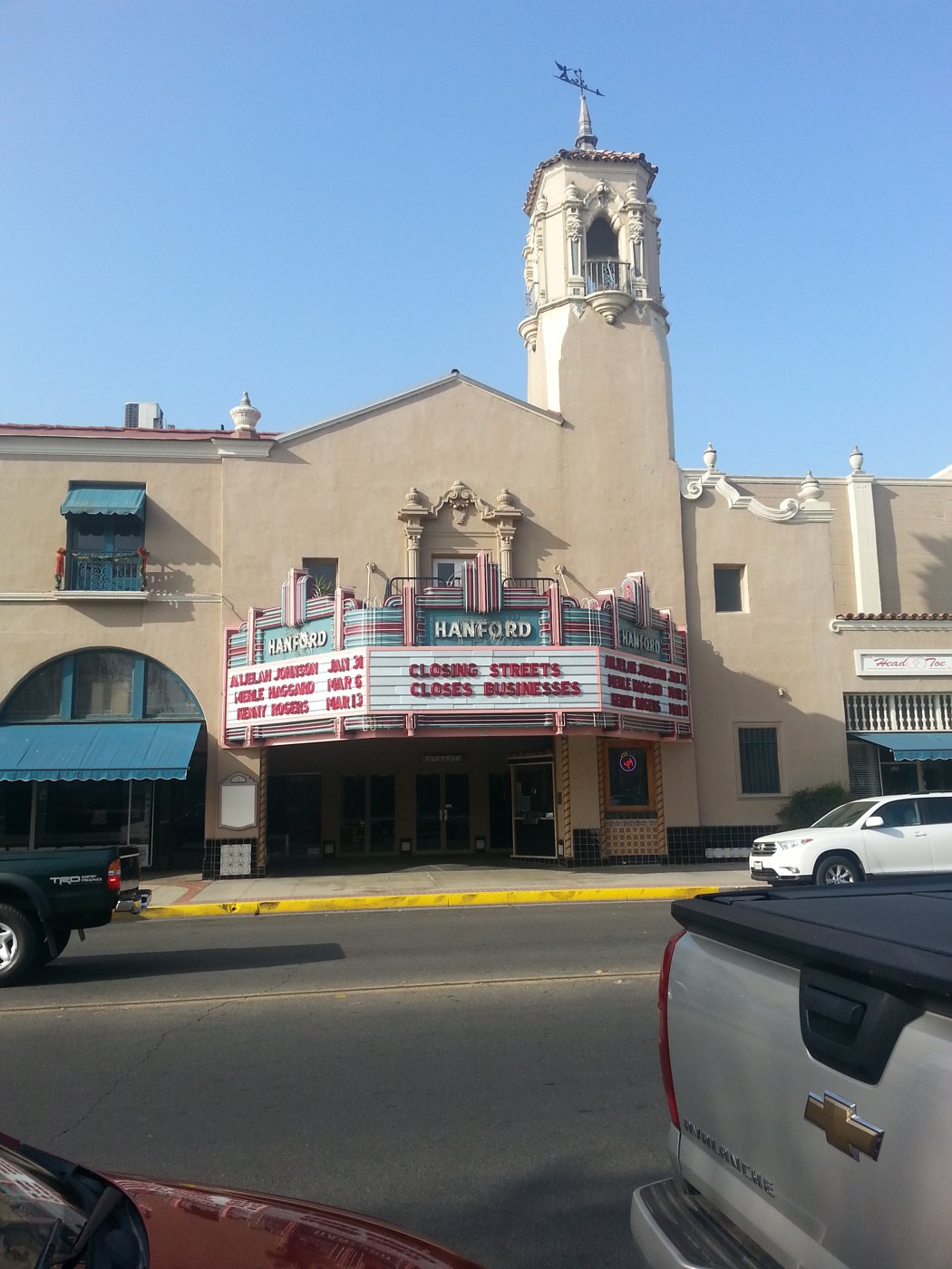 The Hanford Fox Theatre with its Spanish-style tower and neon marquee