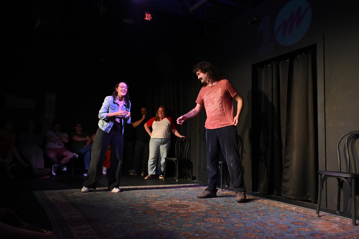 A two-person improv scene at Mettlesome Theater
