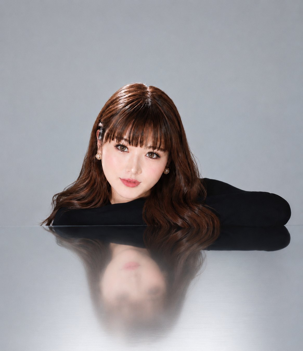 Portrait of pianist LUTILU resting on a mirrored surface