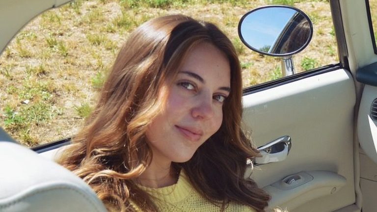 Morgan Starner, Christian pop and soul singer, sitting in a vintage convertible