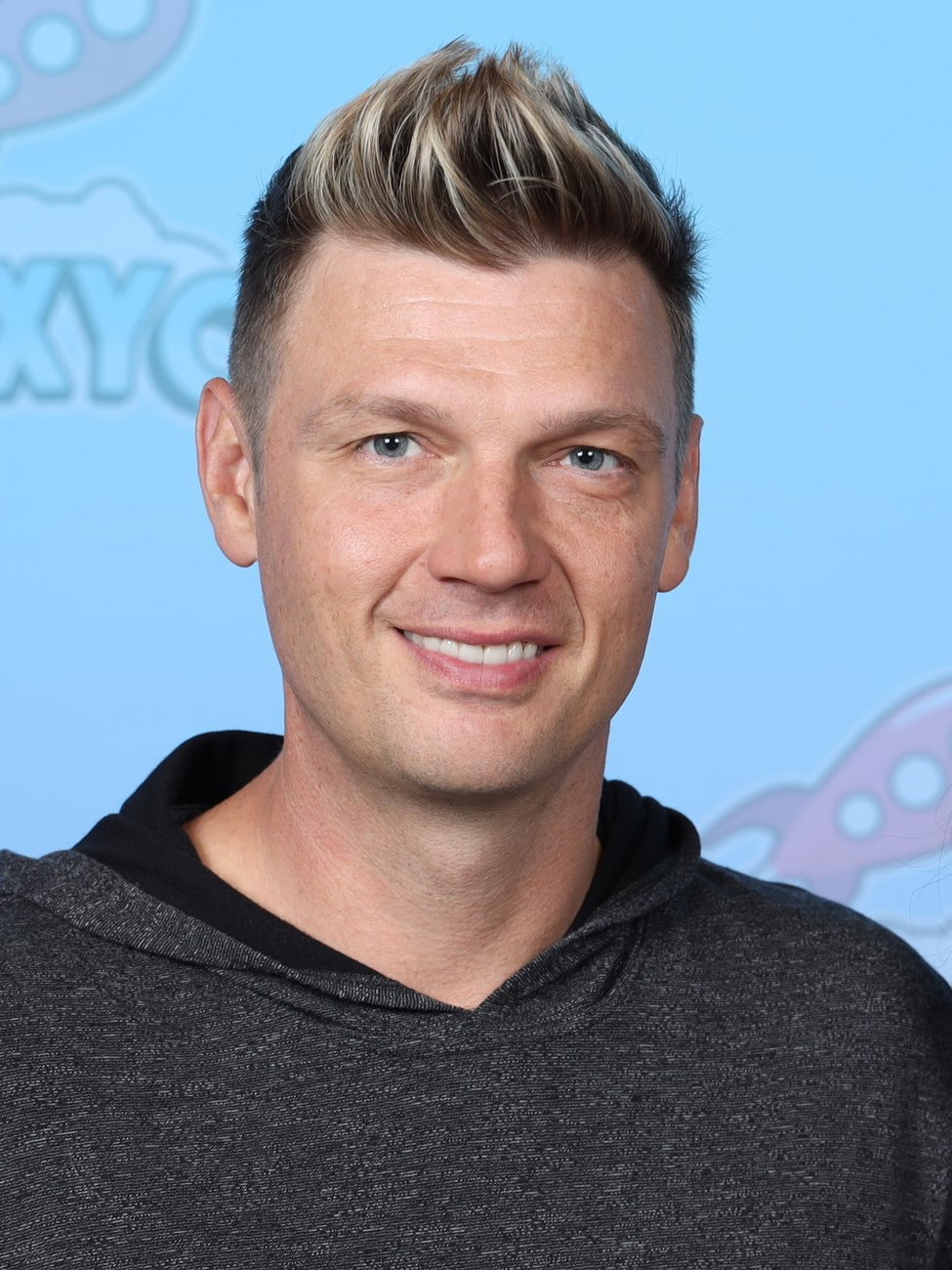 Nick Carter of the Backstreet Boys smiling in 2023