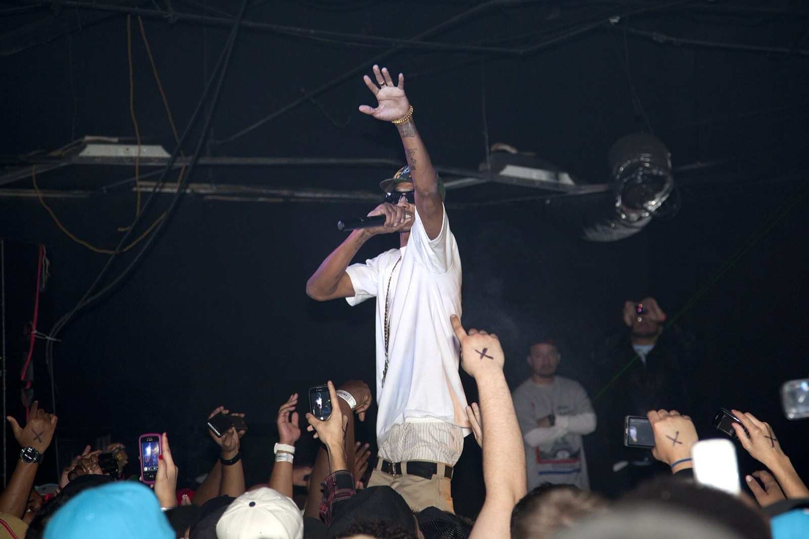 Nipsey Hussle performing on stage in 2010; his song LA Theme Song is the theme of The Drop: A Snowfall Saga