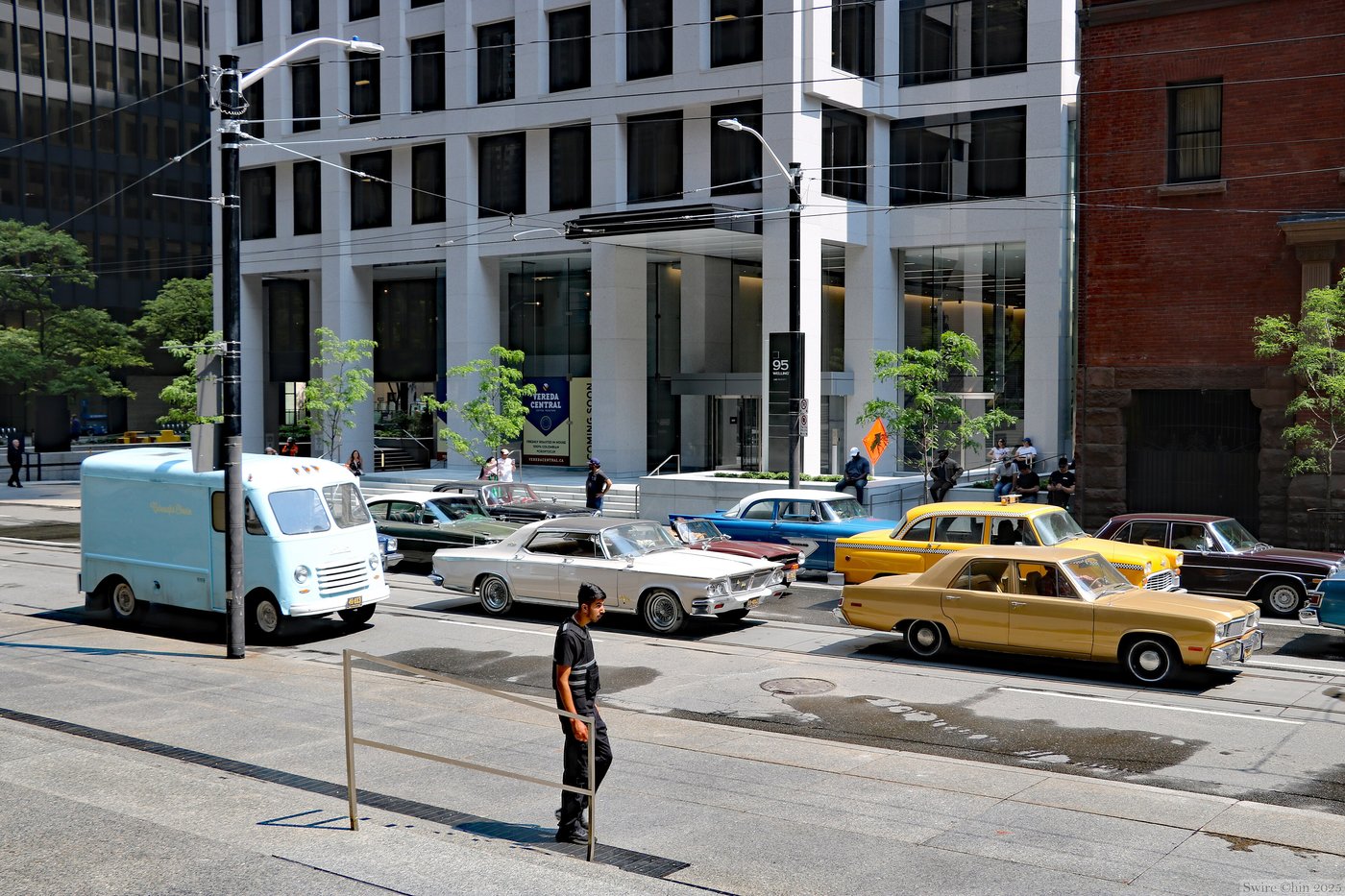 A Toronto street dressed with 1970s cars and taxis for a film shoot