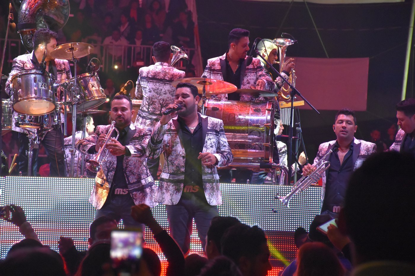 Banda MS performing on stage in Cholula